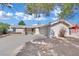 Lovely single-story home with a large driveway and mature landscaping at 3800 San Joaquin Ave, Las Vegas, NV 89102