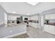 Spacious kitchen featuring granite countertops, white cabinetry and tile backsplash at 3800 San Joaquin Ave, Las Vegas, NV 89102