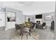 Living Room with a fireplace and ample seating, staged with modern furniture at 3800 San Joaquin Ave, Las Vegas, NV 89102