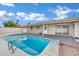 Sparkling pool and patio area, perfect for outdoor entertaining and relaxation at 3800 San Joaquin Ave, Las Vegas, NV 89102