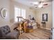 Cozy bedroom with wood-look floors and ample natural light, creating a warm and inviting space at 3882 Genoa Dr, Las Vegas, NV 89141