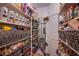 Organized pantry with shelves, baskets, and ample storage space for food items and supplies at 3882 Genoa Dr, Las Vegas, NV 89141