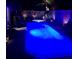 Stunning pool illuminated at night for a dramatic effect at 3882 Genoa Dr, Las Vegas, NV 89141