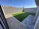 Private backyard featuring a lawn and paved patio, perfect for outdoor relaxation at 4238 Lemay St # 2, Las Vegas, NV 89115