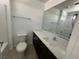 Bathroom featuring a shower-tub combo, vanity, and tile flooring at 4238 Lemay St # 2, Las Vegas, NV 89115