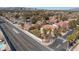 Aerial view of a gated community featuring well-maintained homes and mature trees at 4451 Tomer Ln, Las Vegas, NV 89121