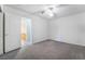 Neutral bedroom with carpet flooring and a ceiling fan at 4451 Tomer Ln, Las Vegas, NV 89121