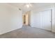 Neutral bedroom with ample closet space and soft carpeting at 4451 Tomer Ln, Las Vegas, NV 89121