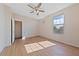 Bedroom featuring wood floor, ceiling fan, and natural light from window at 5855 Valley Dr # 2170, North Las Vegas, NV 89031