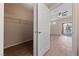 Walk-in bedroom closet featuring wood flooring and wire shelving at 5855 Valley Dr # 2170, North Las Vegas, NV 89031