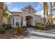 A well-maintained building exterior with desert landscaping and tiled roof, set against a bright, sunny sky at 5855 Valley Dr # 2170, North Las Vegas, NV 89031