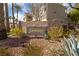 An inviting view of the Jasmine Ranch community sign surrounded by lush desert landscaping at 5855 Valley Dr # 2170, North Las Vegas, NV 89031