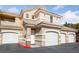 Charming townhome featuring a tile roof and attached garage, perfect for modern living at 5855 Valley Dr # 2170, North Las Vegas, NV 89031