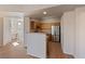 Well-lit kitchen with stainless steel appliances and a view into the hallway and upstairs area at 5855 Valley Dr # 2170, North Las Vegas, NV 89031