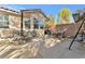 Backyard patio area with a seating arrangement and tiled patio at 5873 Wildhorse Ledge Ave, Las Vegas, NV 89131