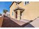 Close up of front porch of home with nice pathway leading to the door at 6430 Jackrabbit Run Ave, Las Vegas, NV 89122