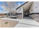 Stunning close up of a front porch with stone accents and modern lighting at 6917 Leon Ave, Las Vegas, NV 89131