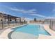 Sparkling pool and spa featuring tile accents and fenced perimeter, perfect for outdoor relaxation and recreation at 6917 Leon Ave, Las Vegas, NV 89131