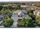 An aerial view captures the home's location surrounded by mature trees in a serene neighborhood at 7220 Shenandoah Springs Ave, Las Vegas, NV 89131