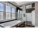 Well-lit bathroom with a large tub, separate shower, and decorative windows at 7220 Shenandoah Springs Ave, Las Vegas, NV 89131