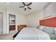 Bedroom featuring a king-size bed, modern fixtures, and ensuite bathroom at 7220 Shenandoah Springs Ave, Las Vegas, NV 89131