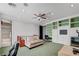 This bedroom features a charming ceiling fan and built in shelving at 7220 Shenandoah Springs Ave, Las Vegas, NV 89131