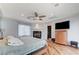 Serene main bedroom featuring a fireplace, hardwood floors, and elegant decor at 7220 Shenandoah Springs Ave, Las Vegas, NV 89131