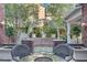 A serene brick patio with an archway, offering a tranquil outdoor space with views of the home at 7220 Shenandoah Springs Ave, Las Vegas, NV 89131