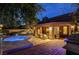 Backyard patio featuring a relaxing spa area with comfortable outdoor seating at 7607 Boca Raton Dr, Las Vegas, NV 89113