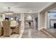 View of the dining room leading to the living room with a stone fireplace at 7607 Boca Raton Dr, Las Vegas, NV 89113