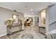 Spacious foyer featuring hardwood floors, adjacent dining area, and seamless transition to the living room at 7607 Boca Raton Dr, Las Vegas, NV 89113