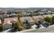 An elevated view of a well-maintained single-story home with desert landscaping in a suburban neighborhood at 7828 Homing Pigeon St, North Las Vegas, NV 89084