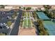 An aerial view of the resort features bocce ball and tennis courts with manicured landscaping at 7828 Homing Pigeon St, North Las Vegas, NV 89084