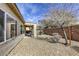 This lovely backyard features a patio, desert landscaping and privacy wall at 7828 Homing Pigeon St, North Las Vegas, NV 89084