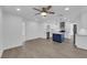 Bright room with a kitchen view, enhanced by recessed lighting and tile floors at 8324 Shark Tank Ct, Las Vegas, NV 89128