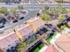 An overhead shot showing a well-maintained backyard, artificial turf, mature trees and private patio space at 840 Sheerwater Ave, Henderson, NV 89052