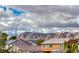 Neighborhood view showing well-maintained homes with neat landscaping, and cloudy skies overhead at 840 Sheerwater Ave, Henderson, NV 89052