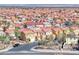 An elevated view of a street in a residential area showcasing the home's surroundings and neighborhood at 840 Sheerwater Ave, Henderson, NV 89052