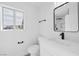 Modern bathroom with a single sink vanity and a view of the shower at 8979 Green Jade Dr, Las Vegas, NV 89129