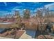 Exterior of home with a terra cotta roof and blue skies at 9001 Marble Dr, Las Vegas, NV 89134