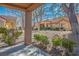 Charming patio view surrounded by manicured landscaping and mature trees, creating a serene outdoor space at 9001 Marble Dr, Las Vegas, NV 89134