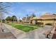 Bocce ball court area with benches, shade structures, and manicured landscaping at 9001 Marble Dr, Las Vegas, NV 89134