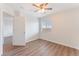 Clean bedroom with wood floors and a window at 9124 Palatial Palette Ct, Las Vegas, NV 89149