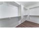 Walk-in closet with wood-look flooring and shelving at 9124 Palatial Palette Ct, Las Vegas, NV 89149