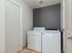 A dedicated laundry area equipped with a washer and dryer, conveniently located near the kitchen at 924 Angel Star Ln, Las Vegas, NV 89145