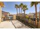 Balcony offering scenic views of the neighborhood and lush palm trees at 9379 Arrowhead Bluff Ave, Las Vegas, NV 89149