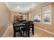 Charming dining area showcases elegant furniture, inviting atmosphere, and picturesque views of outdoor scenery at 9379 Arrowhead Bluff Ave, Las Vegas, NV 89149