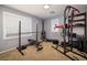 Bright and airy home gym with ample space for workout equipment at 9379 Arrowhead Bluff Ave, Las Vegas, NV 89149