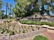 Inviting Sun City Summerlin sign nestled within lush landscaping, greeting residents and visitors alike at 9809 Gerald Ct, Las Vegas, NV 89134