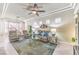 Comfortable living room with a ceiling fan, recessed lighting, and ample seating at 9809 Gerald Ct, Las Vegas, NV 89134